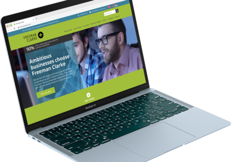 Freeman Clarke Laptop Mockup Testimonial